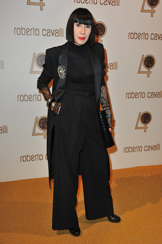 Illustration for article titled Everyone Looks Predictably Ridiculous At Cavalli Party